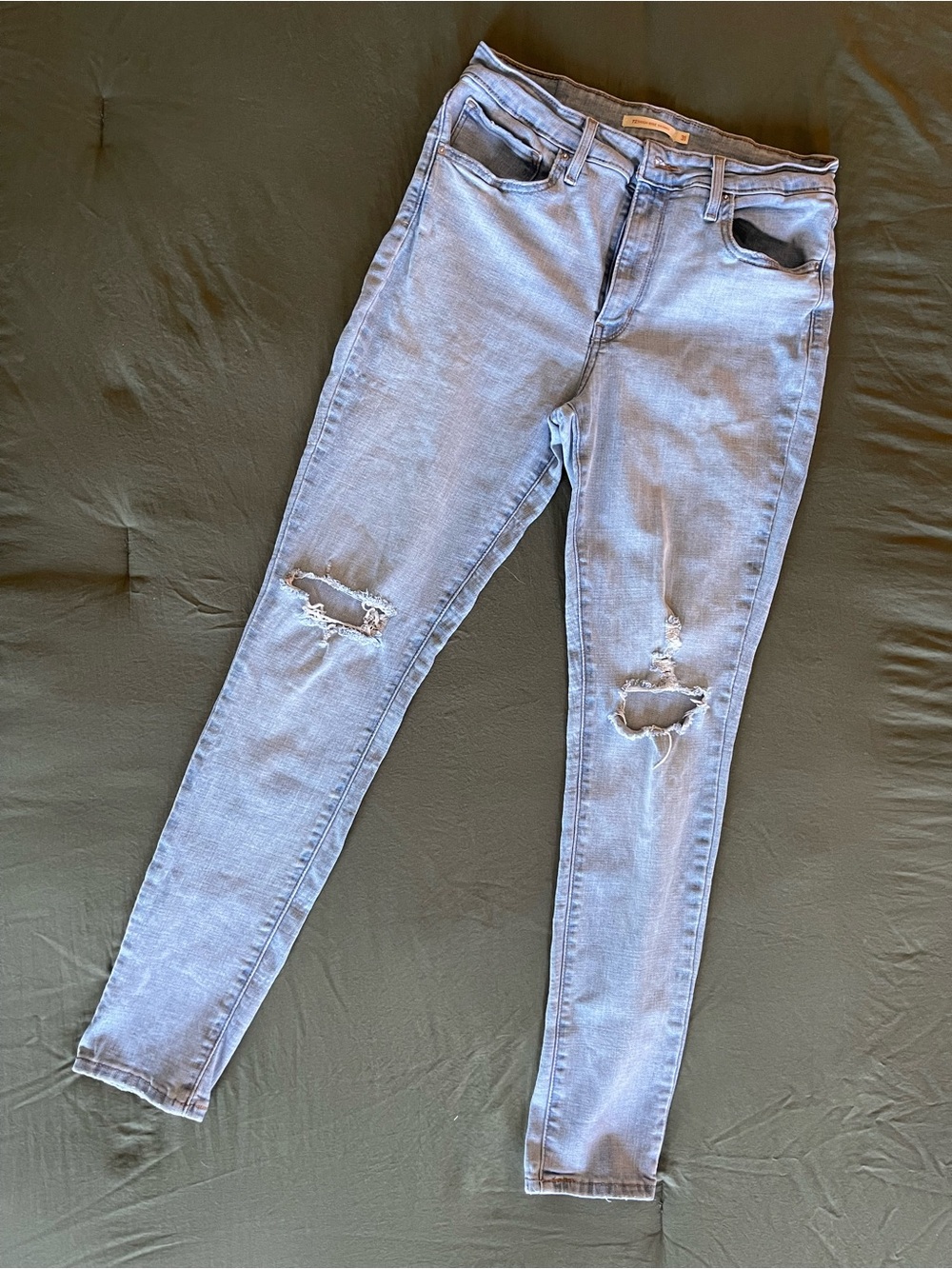 Levi 721 High Rise Women's Light Blue Distressed Skinny Jeans